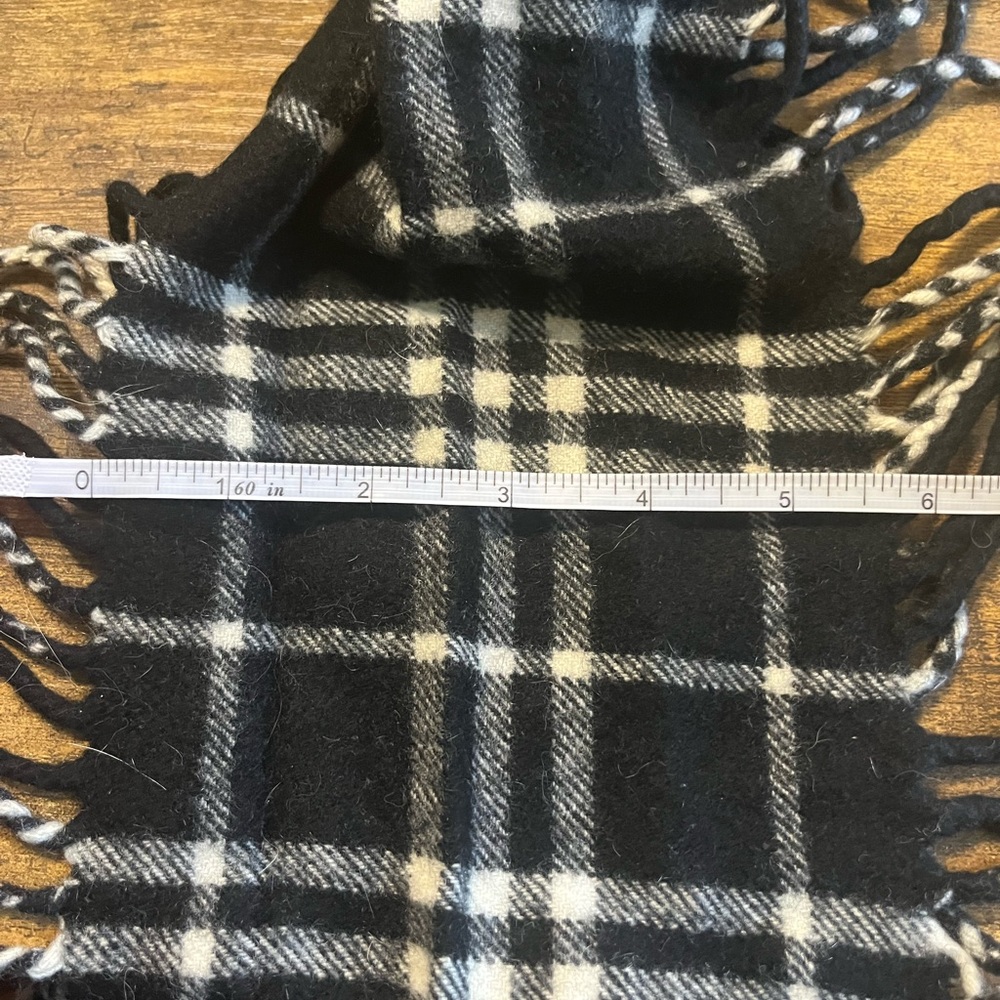 Burberry double fringe scarf.